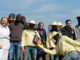 Un gruppo di dodici persone, tra migrati e volontari dell'associazione, del team di lavoro di Bee My Job